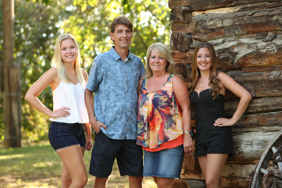 A Large Family is Lined Up and with a Dog Poses in Front of the Camera.  Stock Photo - Image of male, green: 164606456